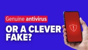 Hand holding smart-phone that is displaying a security warning symbol. Image text: Genuine antivirus—or a clever fake?