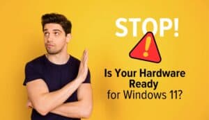 Man with hand in the air indicating to stop. Image text: Stop! Is Your Hardware Ready for Windows 11?
