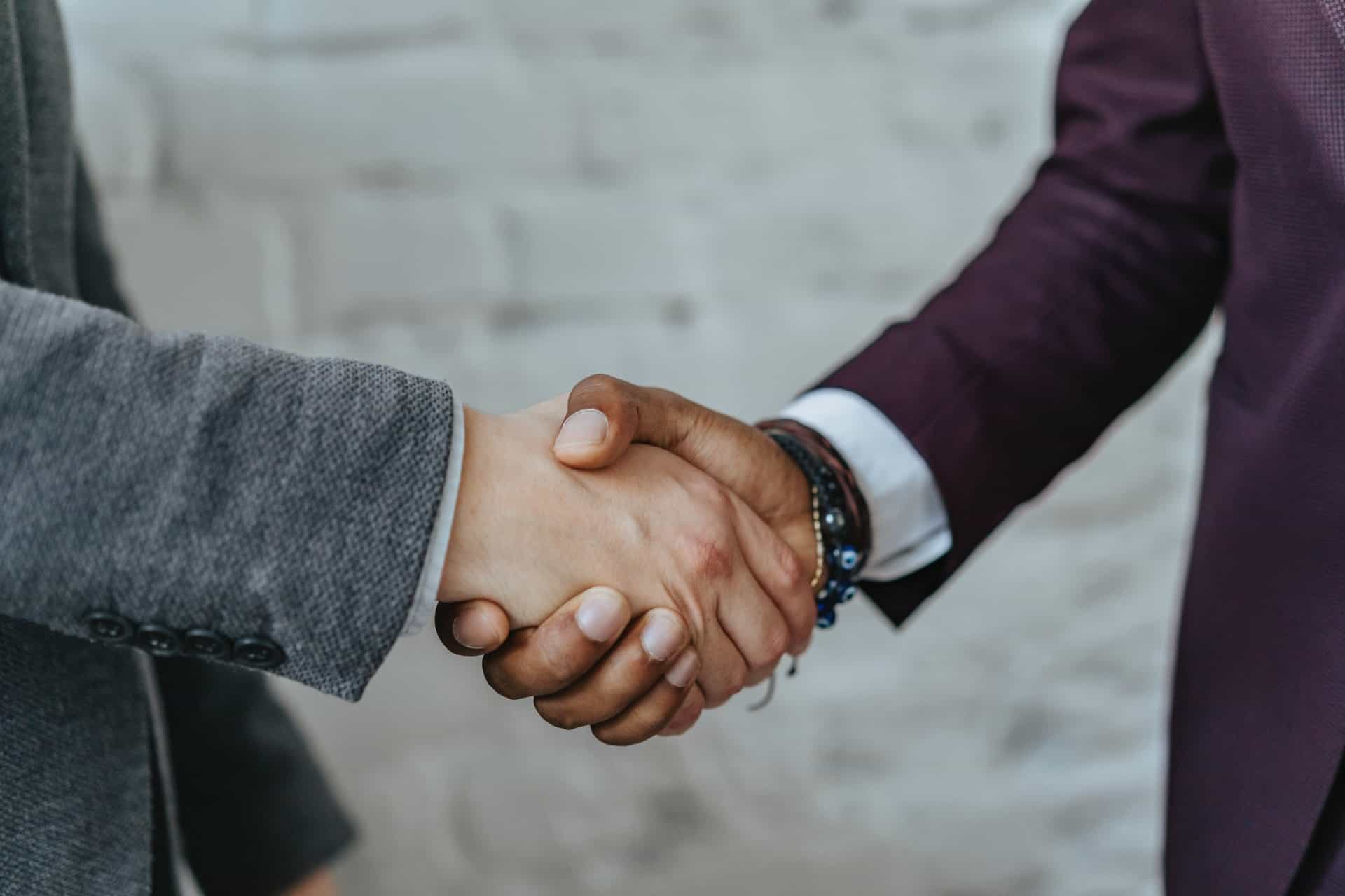 business people shaking hands