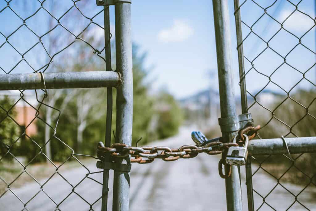 Photo of fence with chain and lock